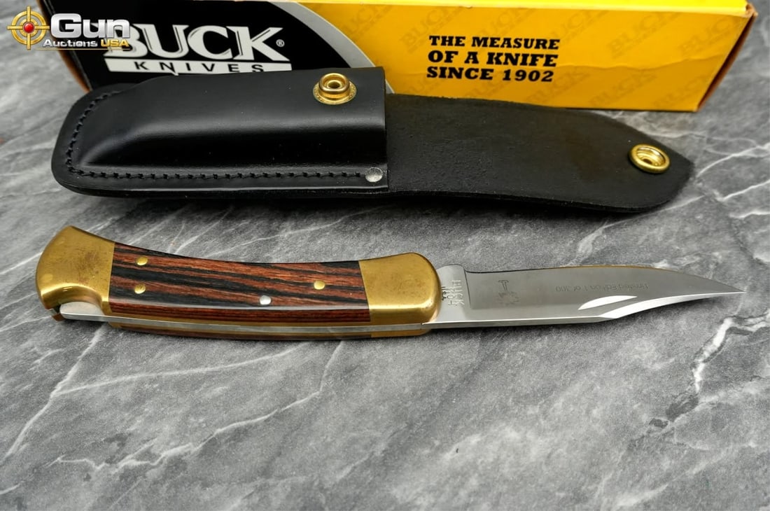 Buck 110 Folding Hunter Limited Edition (1 of 300): Buck 110 Folding Hunter Limited Edition (1 of 300) Chuck Buck Signed Knife with Box. Excellent Condition.This 2006 Buck 110 Folding Hunter is a limited-edition collector's piece, one of just 300 produ