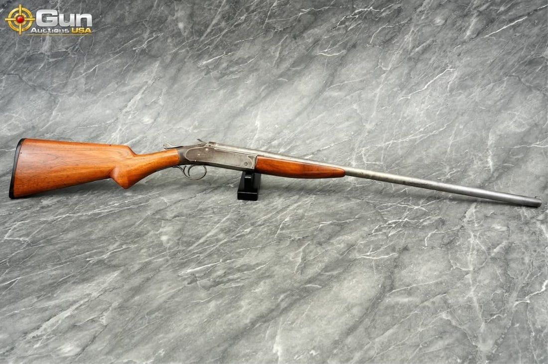 Iver Johnson Champion 16GA Single Shot: IVER JOHNSON CHAMPION 16 GA. Single Shot Shotgun, 28" Barrel, Good Condition, Normal Handling Marks, Shiny Bore, Tight Action, sn:7693EThis single-shot shotgun in 16 gauge features a walnut stock and 