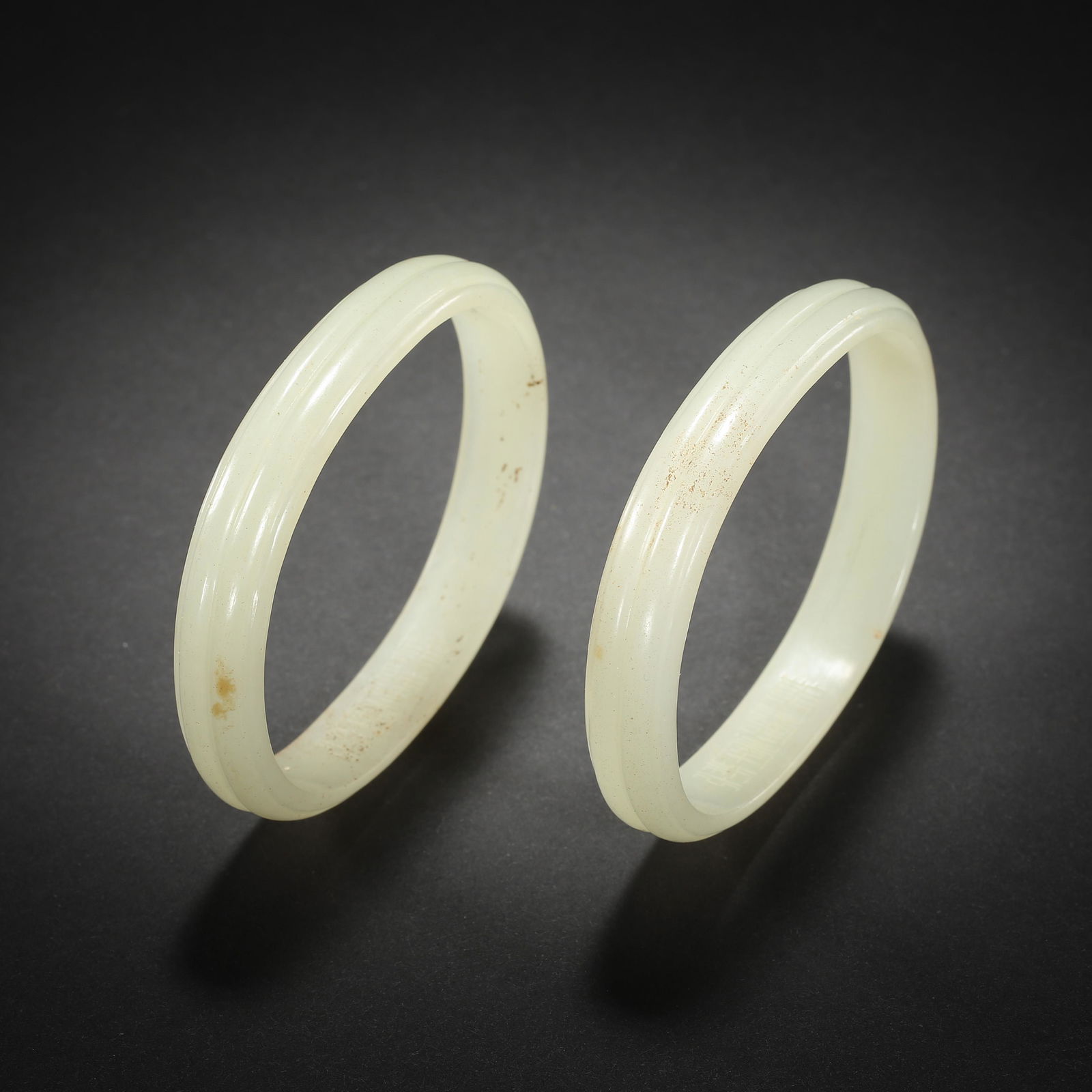 QING DYNASTY, A PAIR OF CHINESE HETIAN JADE BRACELETS (1 of 15)