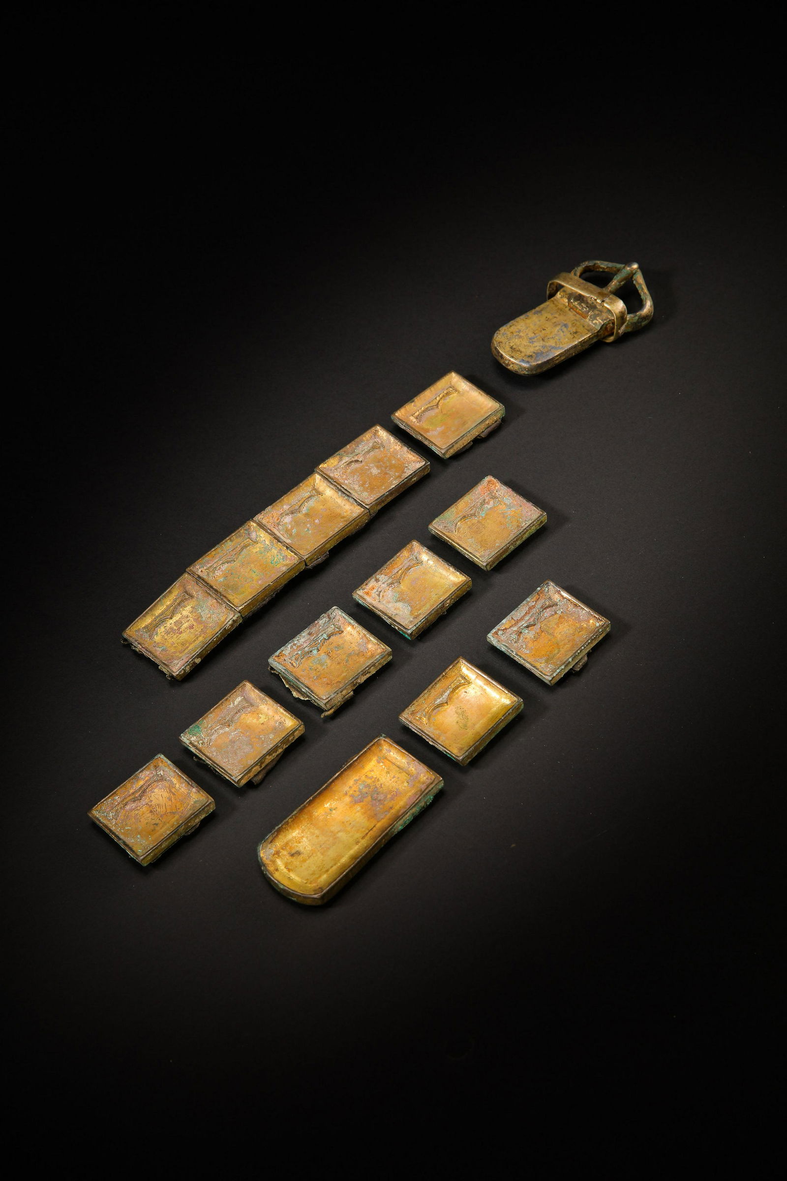 A SET OF CHINESE TANG DYNASTY GILT BRONZE BELT PLATES, 7TH CENTURY (1 of 15)