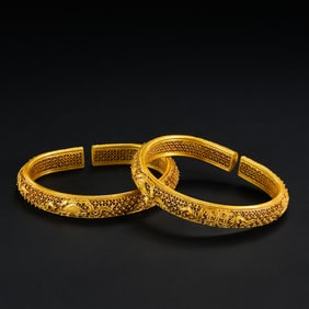 a pair of qing dynasty pure gold bracelets