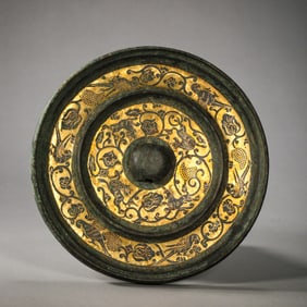 1st to 3rd century bronze mirror inlaid with gold flower and bird pattern, Han Dynasty