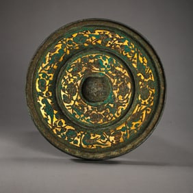 1st to 3rd century bronze mirror inlaid with gold flower pattern, Han Dynasty