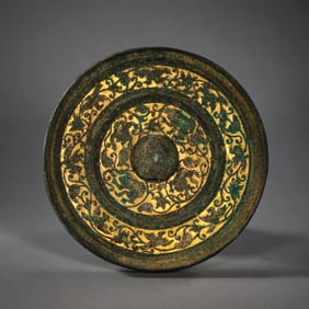 1st to 3rd century bronze mirror inlaid with gold flower pattern, Han Dynasty