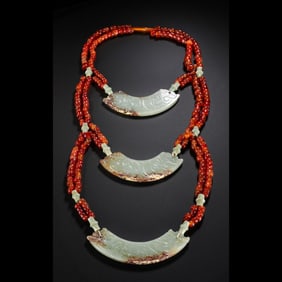 a group of 11th century BC Western Zhou Dynasty agate pearl jades