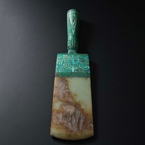 5th century BC to the 3rd century BC a jade ax inlaid with turquoise and jade was produced, Warring