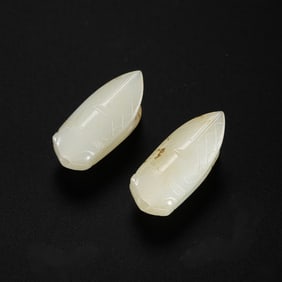 A pair of white jade cicadas, Han Dynasty, 1st to 3rd century