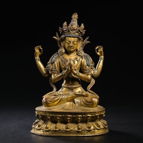 15th century Ming Dynasty gilt bronze seated Buddha statue inlaid with precious stones
