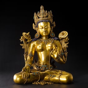 Qing Dynasty gilt bronze and gem-set seated Buddha figure