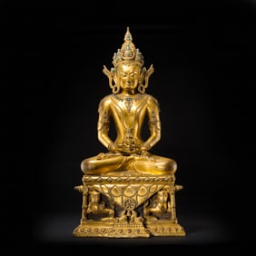 Qing Dynasty gilt bronze and gem-set Buddha seated figure