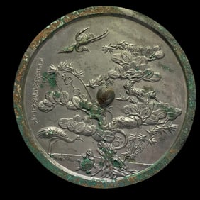 7th-10th century Tang Dynasty bronze mirror with flower and bird patterns