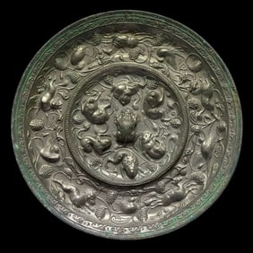 7th-10th century Tang Dynasty bronze mirror with sea beast and grape pattern