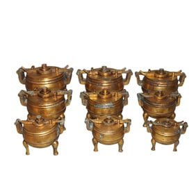A set of gilt bronze tripod-shaped lamps, Han Dynasty, 1st to 3rd century