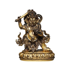 Qing Dynasty gilt bronze standing figure of the God of Wealth