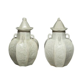 A pair of ding ware white porcelain jars with eight-sided lids, Northern Song Dynasty, 10th to 12th
