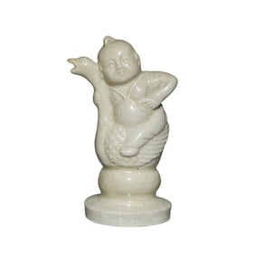 ding ware White porcelain baby statue, Northern Song Dynasty, 10th to 12th century