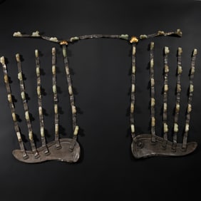 A group of Chinese Liao Dynasty silver-inlaid Hetian jade horse ornaments