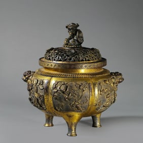 Chinese Ming Dynasty gilt bronze tripod covered stove with double animal heads