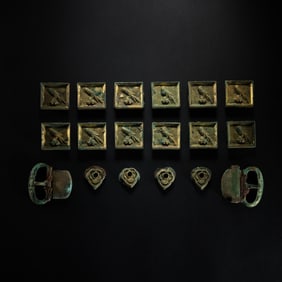 A set of Chinese Liao Dynasty gilt bronze belt plates