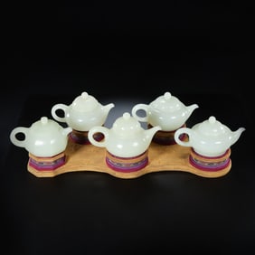 A set of Qing Dynasty Hetian white jade pot