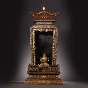 A group of gold-plated mahogany Buddha niches and gilt Buddha statues from the Qianlong period of
