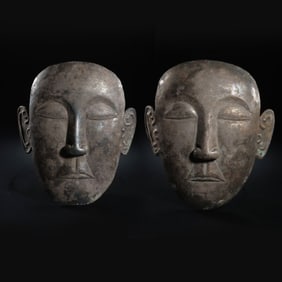 A pair of Chinese Liao Dynasty pure silver masks