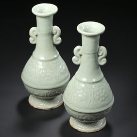 A pair of Longquan ware celadon glazed double-eared vases from the Yuan Dynasty, China