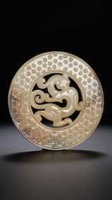 1ST-3RD CENTURY, CHINESE HAN DYNASTY, JADE BI WITH DRAGON PATTERN