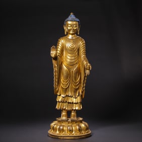 15TH CENTURY, CHINA MING DYNASTY GILT BRONZE BUDDHA STANDING