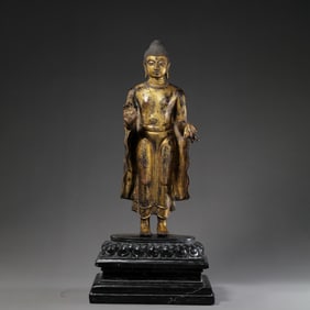 15TH CENTURY, CHINA MING DYNASTY GILT BRONZE BUDDHA STANDING