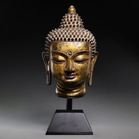 15TH CENTURY, CHINA MING DYNASTY GILT BRONZE BUDDHA HEAD
