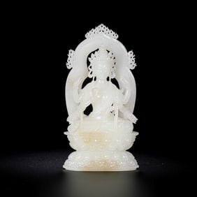 18TH CENTURY, CHINESE HETIAN WHITE JADE SEATED BUDDHA STATUE