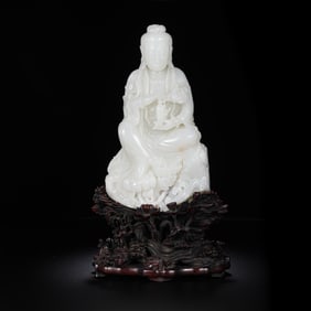 18TH CENTURY, CHINESE HETIAN WHITE JADE SEATED BUDDHA STATUE