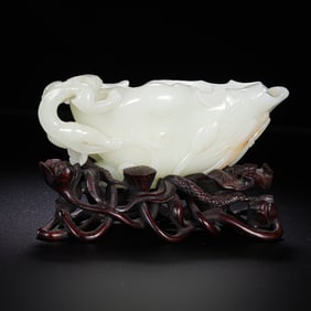 18TH CENTURY, CHINESE QING DYNASTY HOTAN WHITE JADE CLEVERLY CARVED DRAGON HANDLE LOTUS FLOWER CUP