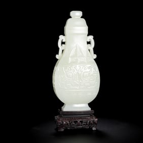 18TH CENTURY, CHINA, QING DYNASTY, HOTAN WHITE JADE BEAST-FACED DOUBLE-EARED COVERED BOTTLE