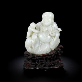 18TH CENTURY, CHINESE QING DYNASTY HETIAN JADE BUDDHA SEATED FIGURE