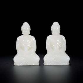 A PAIR OF 18TH CENTURY, CHINESE QING DYNASTY HETIAN WHITE JADE BUDDHA SEATED FIGURES