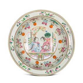 17A FOLDED-RIMMED PLATE WITH FIGURES AND STORIES FROM THE KANGXI PERIOD OF THE QING DYNASTY