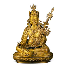 NEPAL, MALLA DYNASTY, GILT-BRONZE SEATED FIGURE OF PADMASAMBHAVA