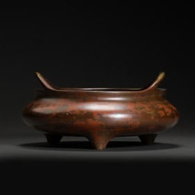 15A BRONZE CENSER WITH TWO HANDLES AND THREE LEGS, DATING FROM THE XUANDE PERIOD OF THE MING