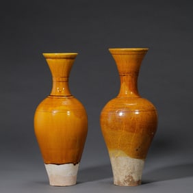10-12A PAIR OF YELLOW-GLAZED LONG-NECKED VASES FROM THE LIAO DYNASTY, CHINA, 18TH CENTURY