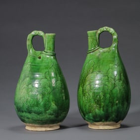10-12A PAIR OF GREEN-GLAZED FLORAL-PATTERNED COCKSCOMB VASES FROM THE LIAO DYNASTY, CHINA, 18TH