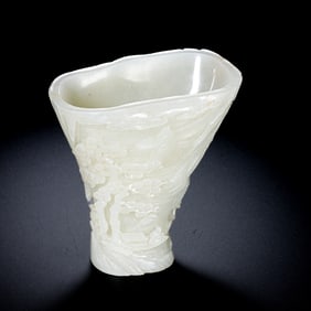 A Chinese Qing Dynasty Hetian white jade goblet with exquisite carvings