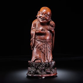 Chinese Qing Dynasty wood carving of Liu Hai playing with the golden toad