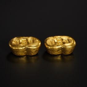 A pair of pure gold ingots from the Qing Dynasty