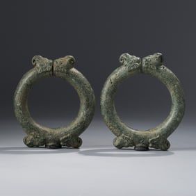 Pair of 12th Century Khmer Bronze Bracelets with Elephant Terminals