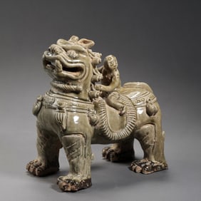 Chinese Sui Dynasty Xiangzhou Kiln Celadon Hu Man Riding a Lion