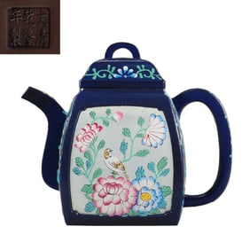 Chinese famille rose floral and bird patterned purple clay teapot from the Qianlong period of the