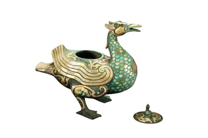 A bird-shaped vessel inlaid with gold and silver from the Warring States period of China.