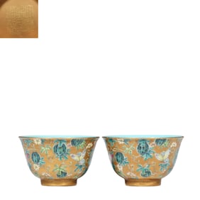 A pair of Chinese Qing Dynasty Qianlong period famille rose watermelon-patterned cups and bowls